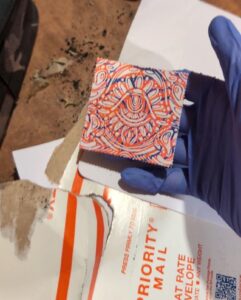 LSD (Lysergic acid diethylamide) blotter paper is a common form in which the potent synthetic psychedelic substance is distributed. It consists of absorbent paper, often featuring intricate designs, that has been saturated with a liquid LSD solution and perforated into small individual squares, known as "tabs."